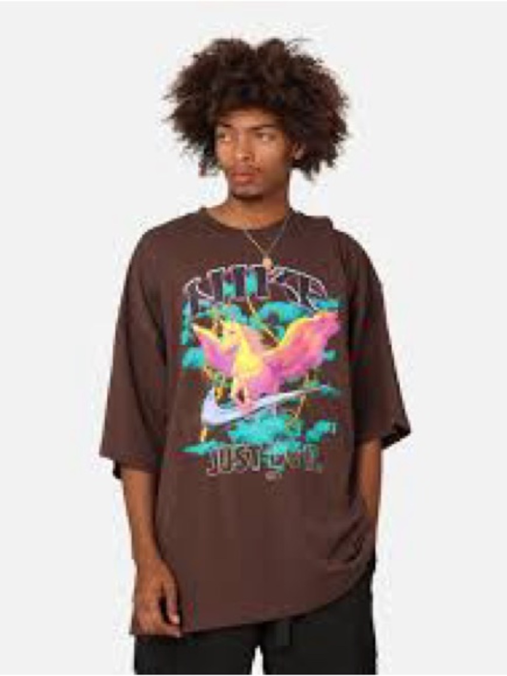 Nike Men's Brown Oversized Short-Sleeve Graphic Tee with Colorful Pegasus Print